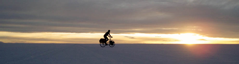 cycling in the salar in the sunset